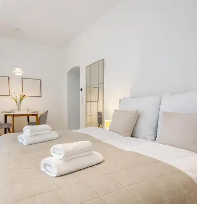 Ein Bett oder Betten in einem Zimmer der Unterkunft Suites am Herzogberg