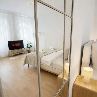 Ein Bett oder Betten in einem Zimmer der Unterkunft Suites am Herzogberg