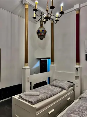 Ein Bett oder Betten in einem Zimmer der Unterkunft Vienna-Guestroom