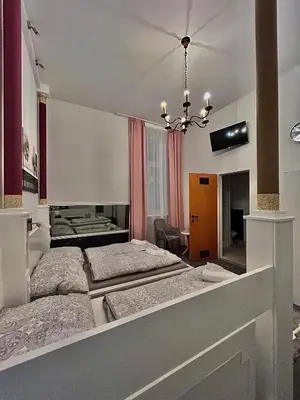 Ein Bett oder Betten in einem Zimmer der Unterkunft Vienna-Guestroom