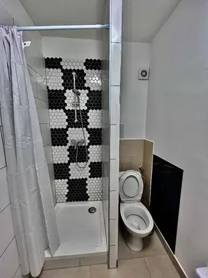 Ein Badezimmer in der Unterkunft Vienna-Guestroom