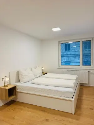 Ein Bett oder Betten in einem Zimmer der Unterkunft Schönbrunn Central Apartment
