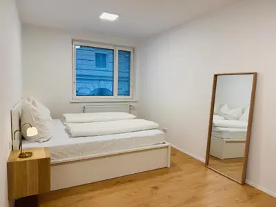 Ein Bett oder Betten in einem Zimmer der Unterkunft Schönbrunn Central Apartment