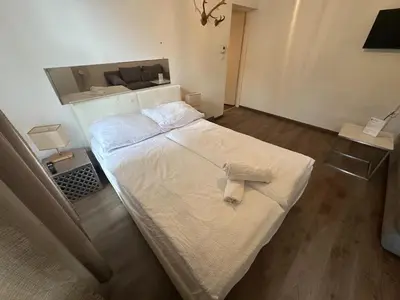 Ein Bett oder Betten in einem Zimmer der Unterkunft Quiet centrally located apartment in Vienna
