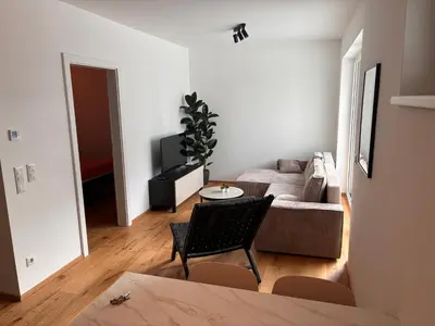 Ein Sitzbereich in der Unterkunft Superior apartment - UNO City & Kaiserwasser