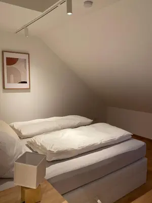 Ein Bett oder Betten in einem Zimmer der Unterkunft Apartments at Rochusmarkt