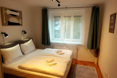 Ein Bett oder Betten in einem Zimmer der Unterkunft Unbeatable infrastructure - near Vienna Central Station