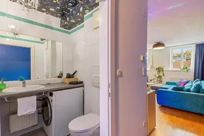 Ein Badezimmer in der Unterkunft Milky Way - Unique Universe Space Design - Gym - Parking