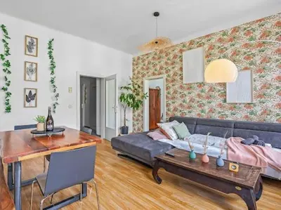 Ein Sitzbereich in der Unterkunft BOHO Dream Apartment 4BR AC Big