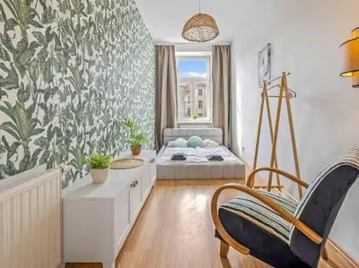 Ein Bett oder Betten in einem Zimmer der Unterkunft BOHO Dream Apartment 4BR AC Big