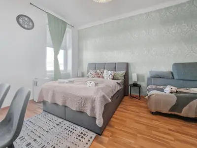 Ein Bett oder Betten in einem Zimmer der Unterkunft NWEST Augarten