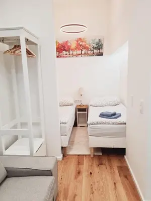 Ein Bett oder Betten in einem Zimmer der Unterkunft Cozy Top Apart close to the city