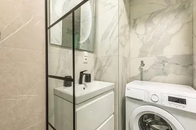 Ein Badezimmer in der Unterkunft Compact Luxury by JR City Apartments