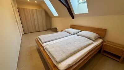 Ein Bett oder Betten in einem Zimmer der Unterkunft Apartment P&T Top 6