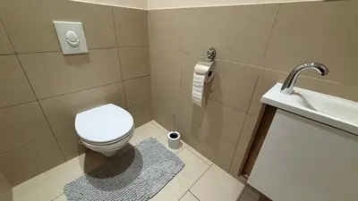 Ein Badezimmer in der Unterkunft Apartment P&T Top 6