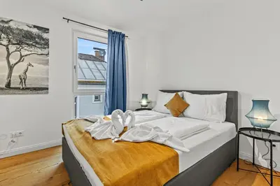 Ein Bett oder Betten in einem Zimmer der Unterkunft NobleNest Cozy - Parkplatz - Terrasse - Küche