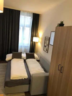 Ein Bett oder Betten in einem Zimmer der Unterkunft New Urban Chic with free parking near subway