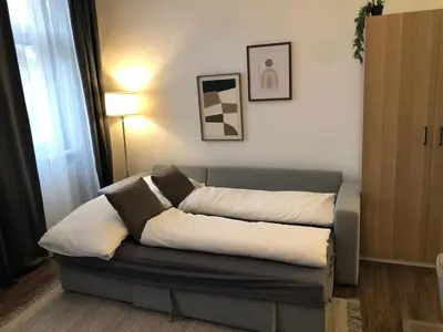 Ein Bett oder Betten in einem Zimmer der Unterkunft New Urban Chic with free parking near subway