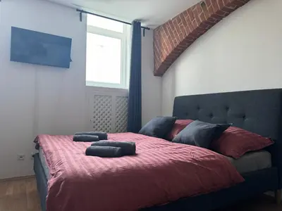 Ein Bett oder Betten in einem Zimmer der Unterkunft Classy Refined Apartment