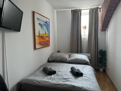 Ein Bett oder Betten in einem Zimmer der Unterkunft Classy Refined Apartment