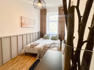 Ein Bett oder Betten in einem Zimmer der Unterkunft Lerchenfeld Soft Home