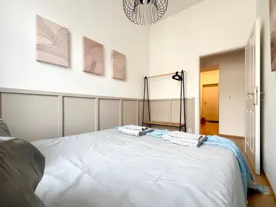 Ein Bett oder Betten in einem Zimmer der Unterkunft Lerchenfeld Soft Home