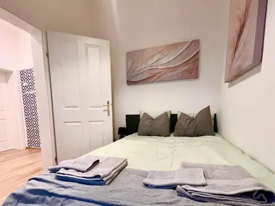 Ein Bett oder Betten in einem Zimmer der Unterkunft Lerchenfeld Soft Home