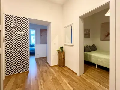 Ein Bett oder Betten in einem Zimmer der Unterkunft Lerchenfeld Soft Home