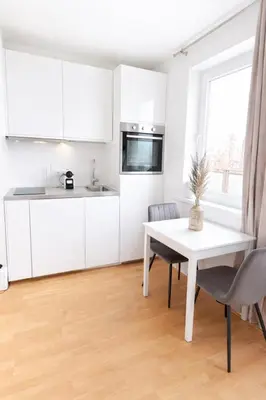 Küche/Küchenzeile in der Unterkunft Zeus Design Apartments Rosenpark