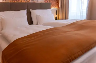 Ein Bett oder Betten in einem Zimmer der Unterkunft OLIVER comfy I Apartments with self check-in