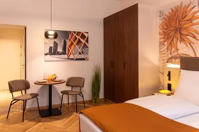 Ein Bett oder Betten in einem Zimmer der Unterkunft OLIVER comfy I Apartments with self check-in