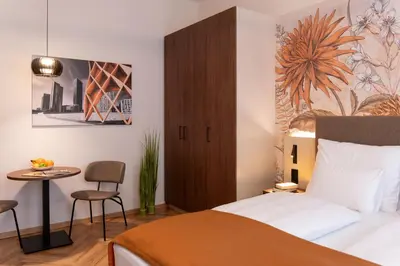 Ein Bett oder Betten in einem Zimmer der Unterkunft OLIVER comfy I Apartments with self check-in