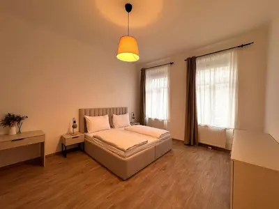 Ein Bett oder Betten in einem Zimmer der Unterkunft Bright Rooms, 6 Minutes to Metro U3