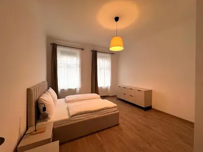 Ein Bett oder Betten in einem Zimmer der Unterkunft Bright Rooms, 6 Minutes to Metro U3