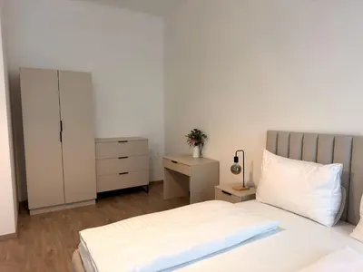 Ein Bett oder Betten in einem Zimmer der Unterkunft Bright Rooms, 6 Minutes to Metro U3