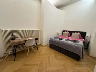 Ein Bett oder Betten in einem Zimmer der Unterkunft Apartments HARTL