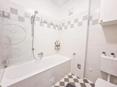 Ein Badezimmer in der Unterkunft FeelHome - Desgin Apartment für 4 Gäste - Smart TV - Naschmarkt