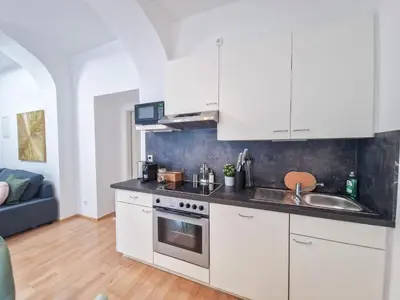 Küche/Küchenzeile in der Unterkunft FeelHome - Desgin Apartment für 4 Gäste - Smart TV - Naschmarkt