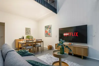 TV/Unterhaltungsangebot in der Unterkunft Bauhaus-Loft - Garten mit Terrasse - 20min zu Wien Mitte - Smart TV