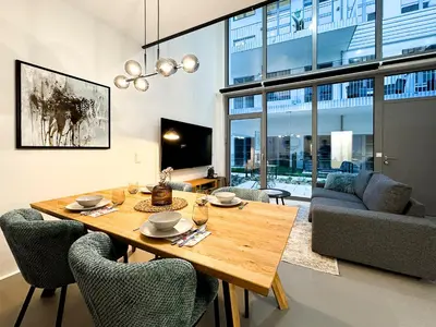 Ein Sitzbereich in der Unterkunft Bauhaus-Loft - Garten mit Terrasse - 20min zu Wien Mitte - Smart TV
