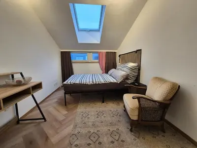 Ein Bett oder Betten in einem Zimmer der Unterkunft Rooftop Loft 2