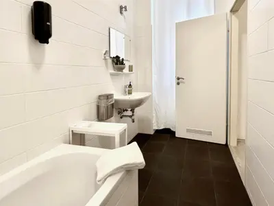 Ein Badezimmer in der Unterkunft SERVUS HOMES Apartments Vienna - Metro Stadthalle