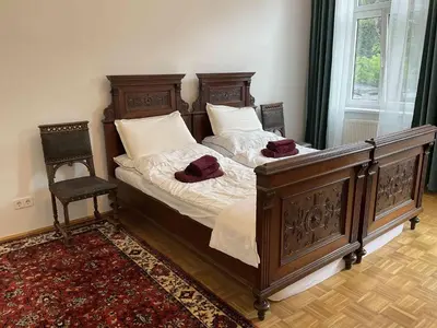 Ein Bett oder Betten in einem Zimmer der Unterkunft CASA DIVA Apartment Vienna-Neuwaldegg
