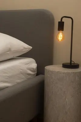 Ein Bett oder Betten in einem Zimmer der Unterkunft Stylish apartment with garden
