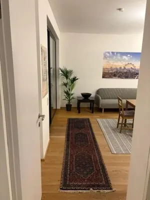 Ein Sitzbereich in der Unterkunft Erdgeschosswohnung mit Garage und Innenhof - westliches Wien