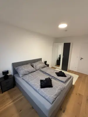 Ein Bett oder Betten in einem Zimmer der Unterkunft My Deer Apartment