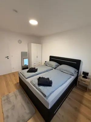 Ein Bett oder Betten in einem Zimmer der Unterkunft My Deer Apartment