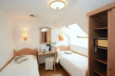 Ein Bett oder Betten in einem Zimmer der Unterkunft Hotel & Restaurant Braunstein - Pauli´s Stuben