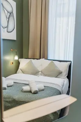 Ein Bett oder Betten in einem Zimmer der Unterkunft HOME1 - Belvedere Boutique Hostel