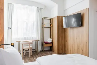 Ein Bett oder Betten in einem Zimmer der Unterkunft FortyPlusOne Apartments Vienna